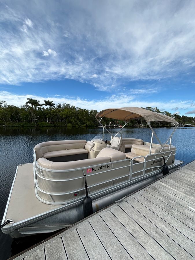 Borrow-A-Boat pontoon delivered to a Fort Myers Beach vacation rental dock